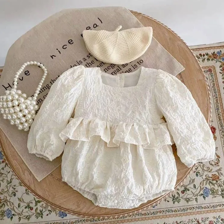 Baby Girls Ivory Embossed Ruffle Waist Romper