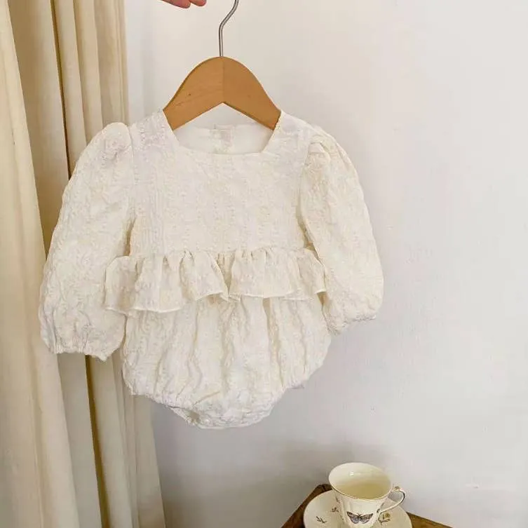 Baby Girls Ivory Embossed Ruffle Waist Romper