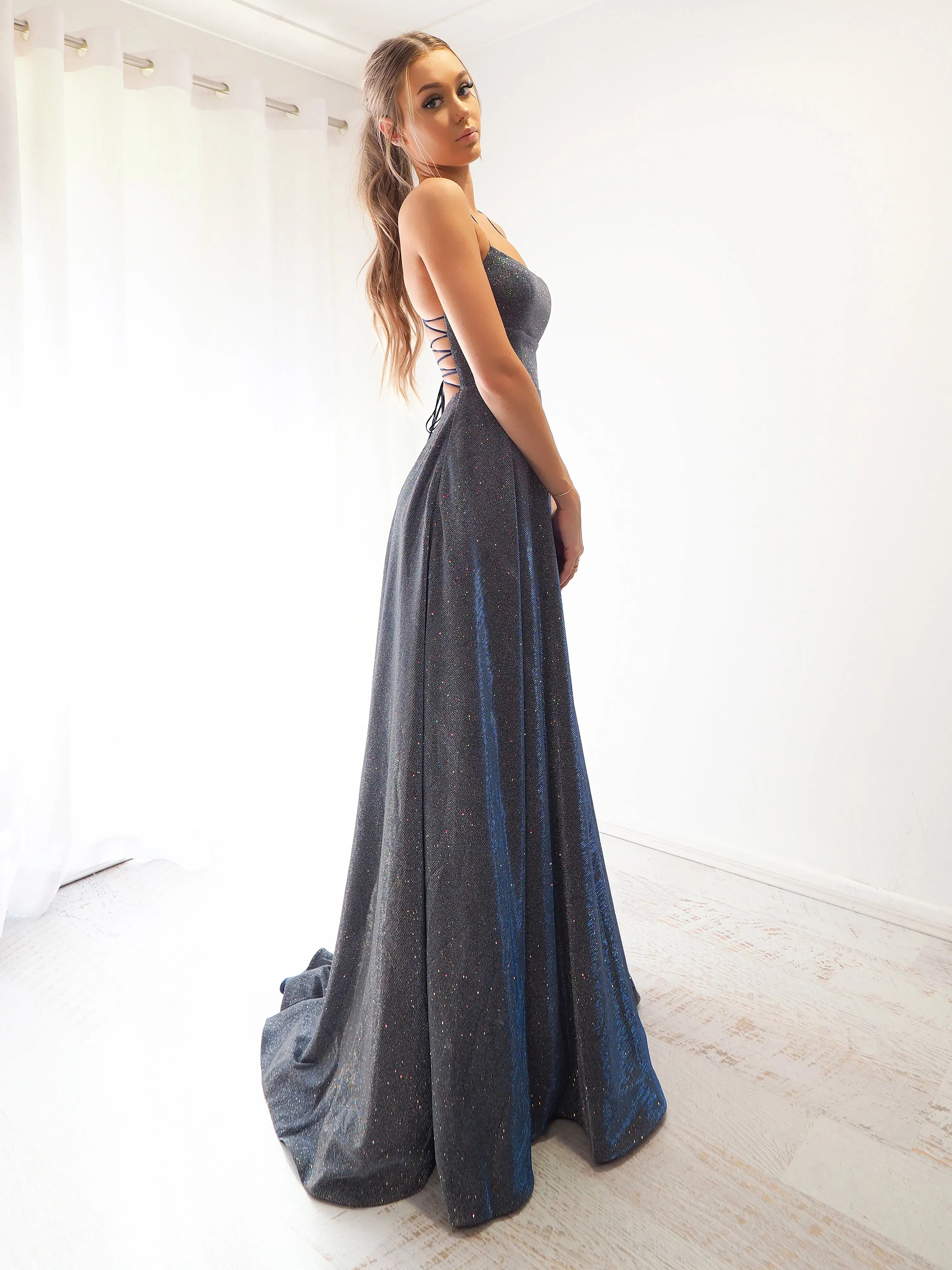 Sparkling holographic electrifying blue dress with slit
